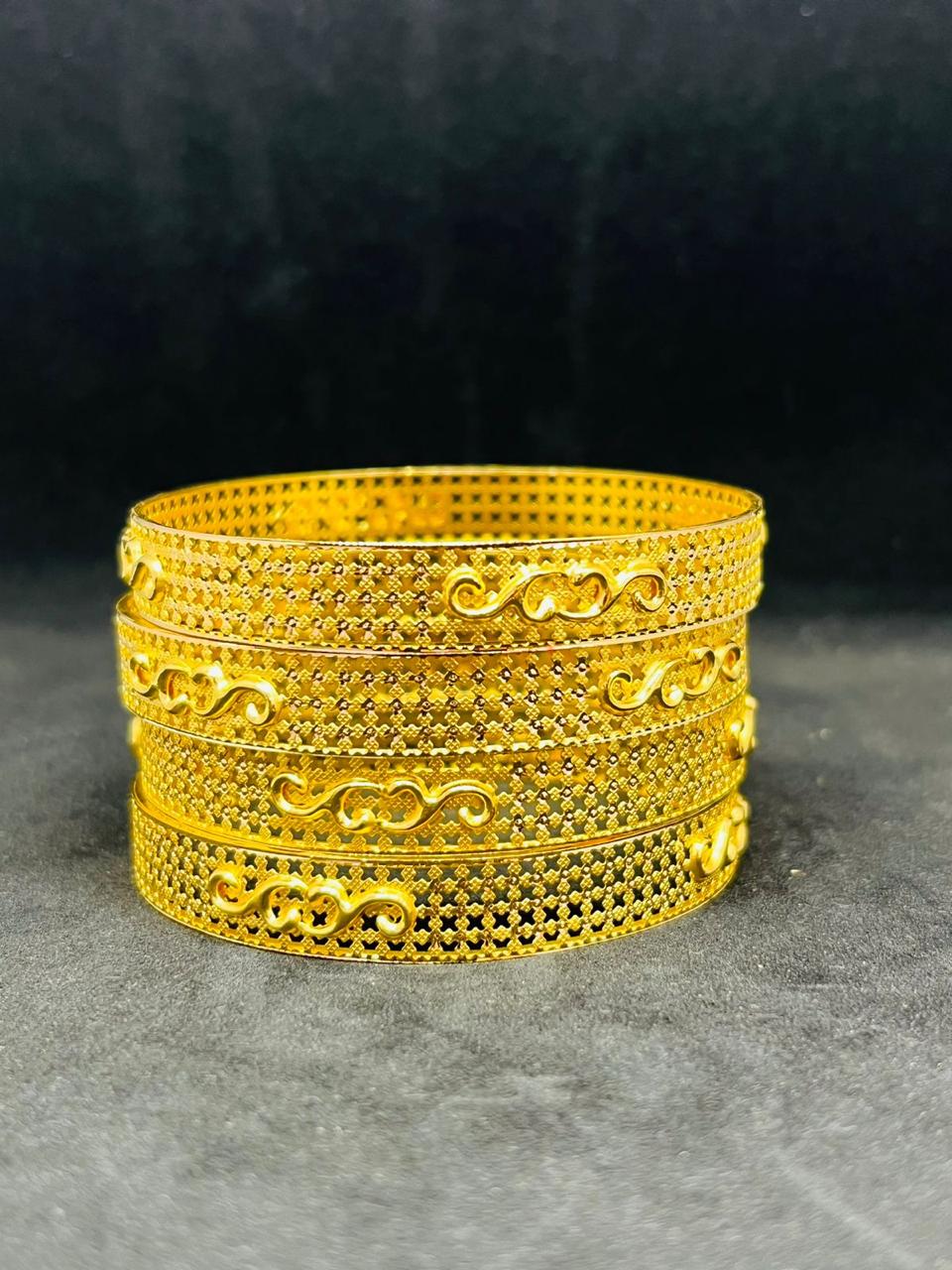 Carved gold bangles