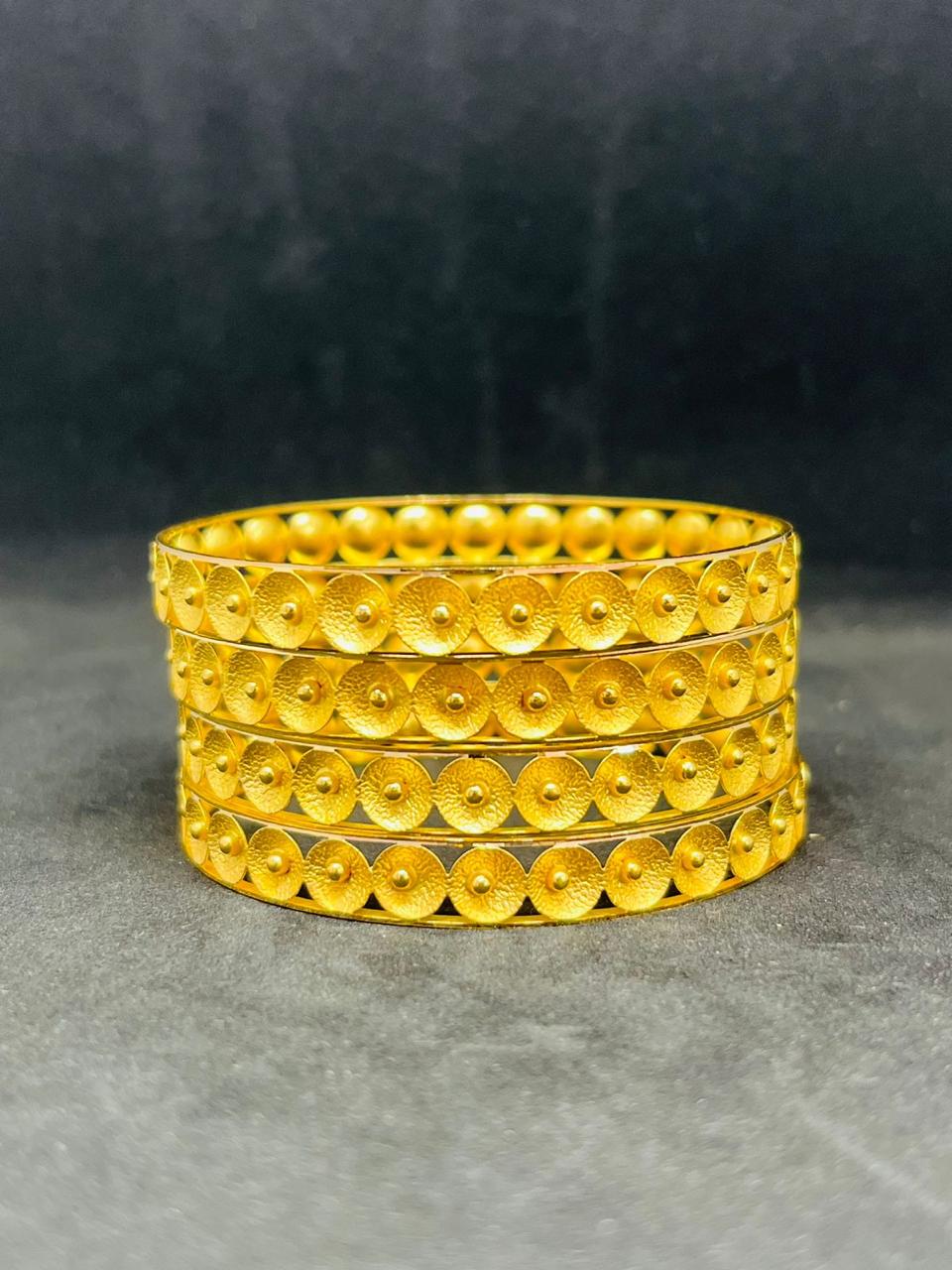 Dotted pattern gold bangles