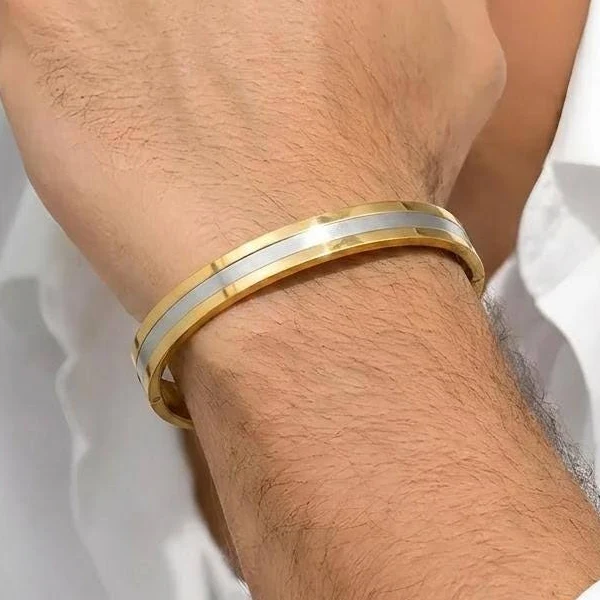 Two-tone cuff bracelet on wrist