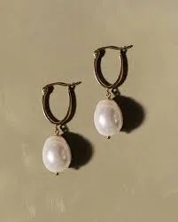 Gold hoop earrings with pearl drop