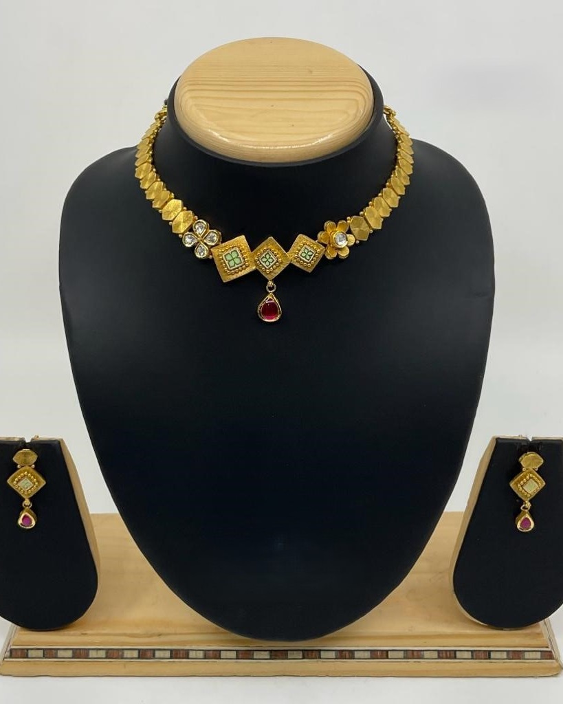 Geometric kundan necklace set with ruby drop