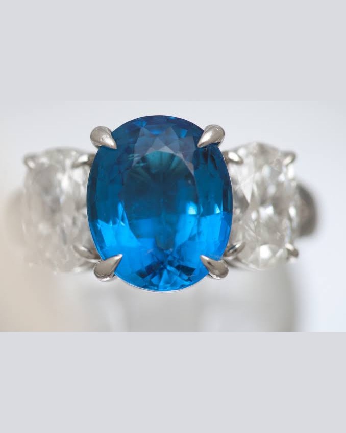 Blue gemstone ring with diamonds