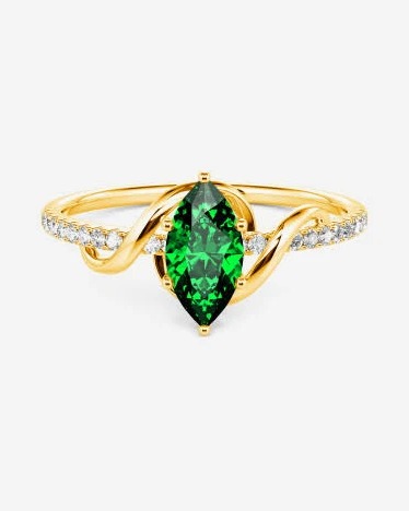 Marquise emerald ring with diamond swirl